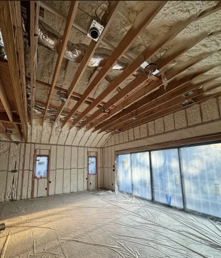 Interior walls and ceiling insulated with spray foam during new construction in Doral
